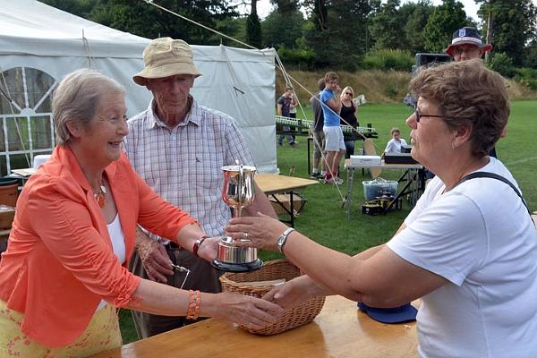 1. Show champion Daphne Preston collects her cup from Edwina.jpg